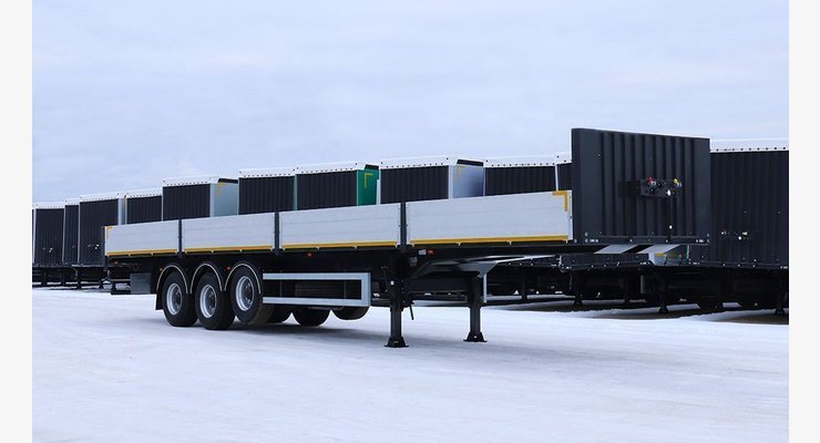 Полуприцеп бортовой Тонар B3-13 9888 — задний боковой вид