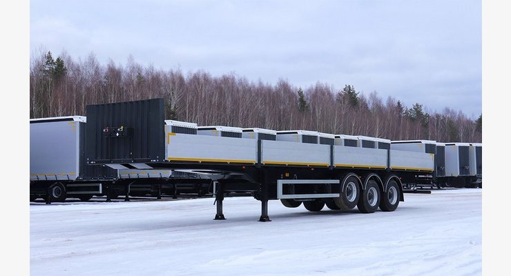 Полуприцеп бортовой Тонар B3-13 9888 — боковой вид